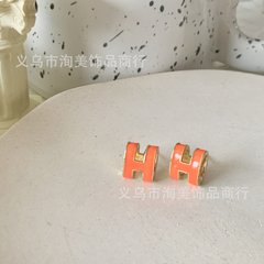 Вінтажні сережки Hermès пусети помаранчеві 1шт